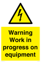 warning-work-in-progress-on-equipmentwith-electrical-hazard-symbol~